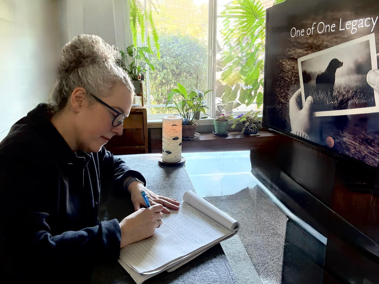 Documentary filmmaker recording and assembling a custom family legacy film.